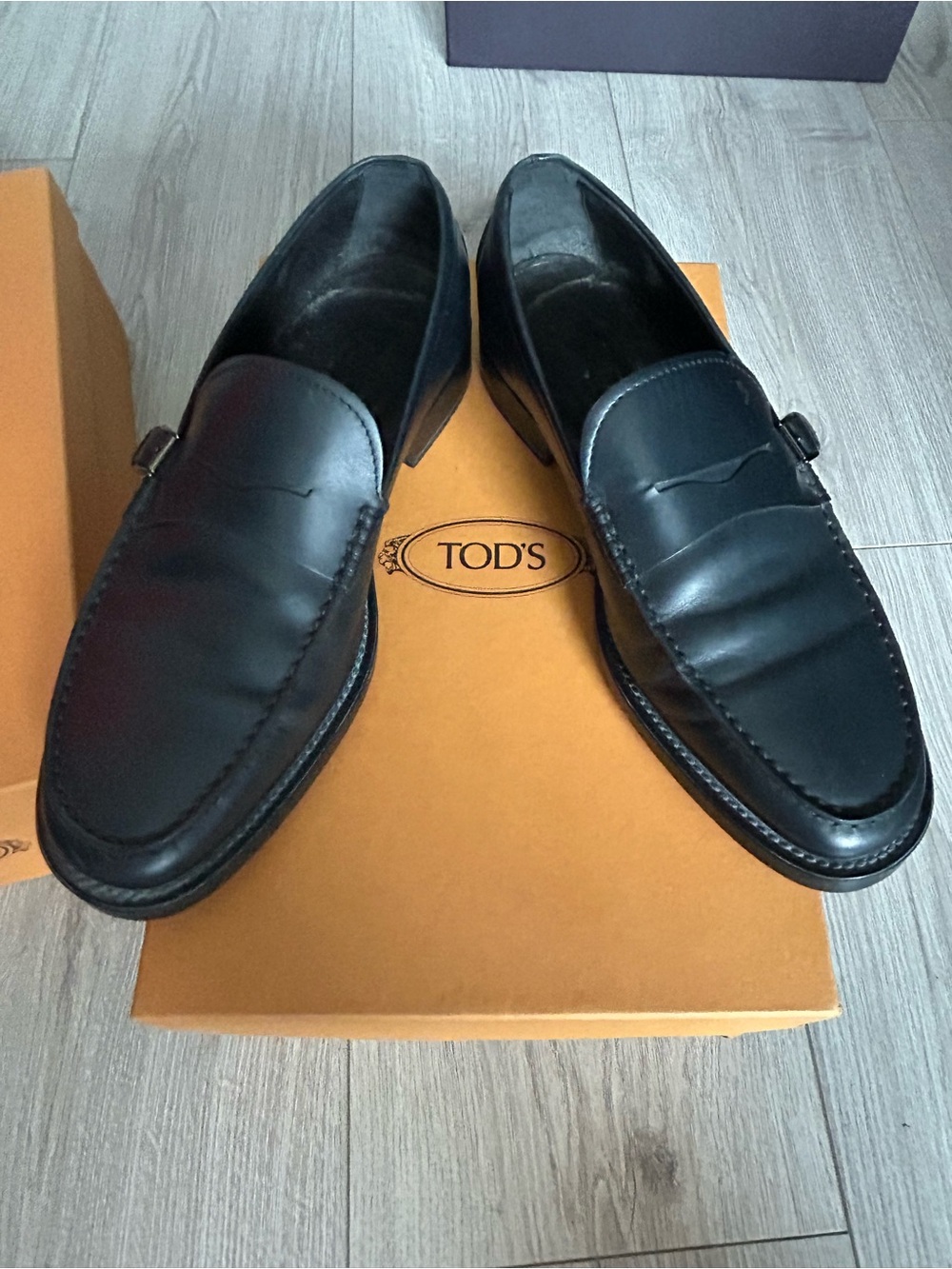 Tod's Black Leather Penny Loafers